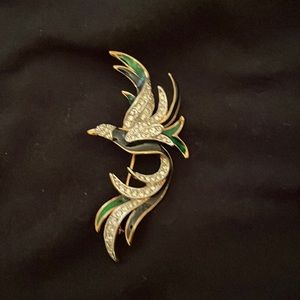 Enamel and pave gold bird in flight brooch